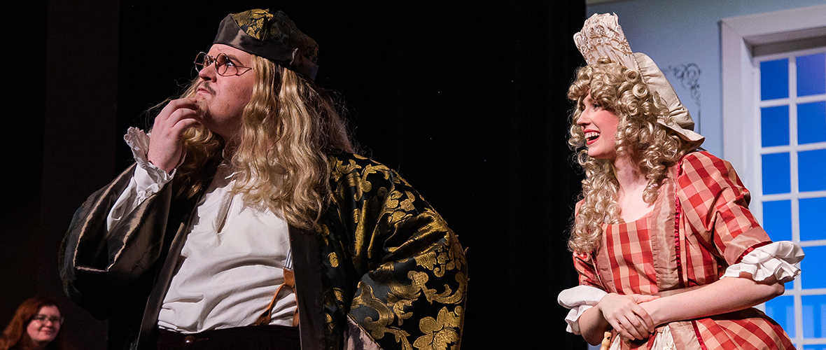 two student perform in the imaginary invalid